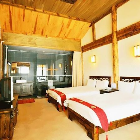 Golden Waterfront Inn Лиджанг Екстериор снимка